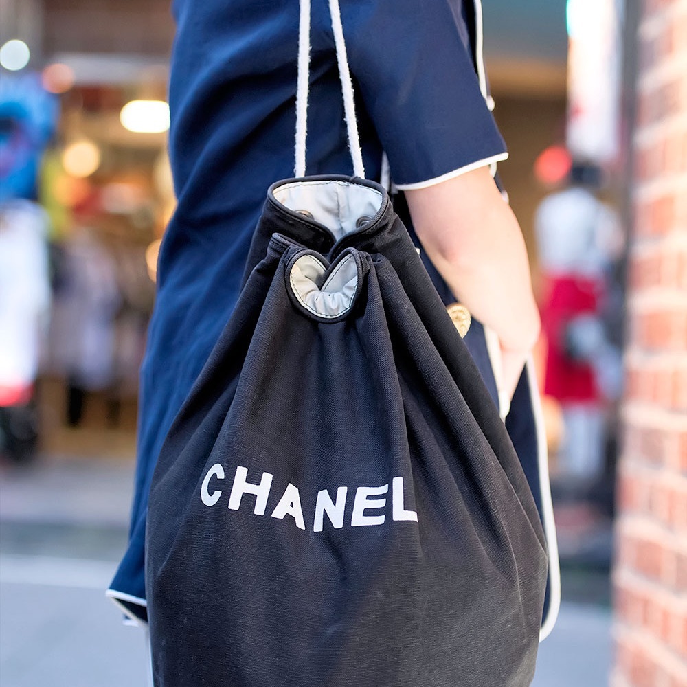 CHANEL Black and White Drawstring Backpack Canvas Beach Bag
